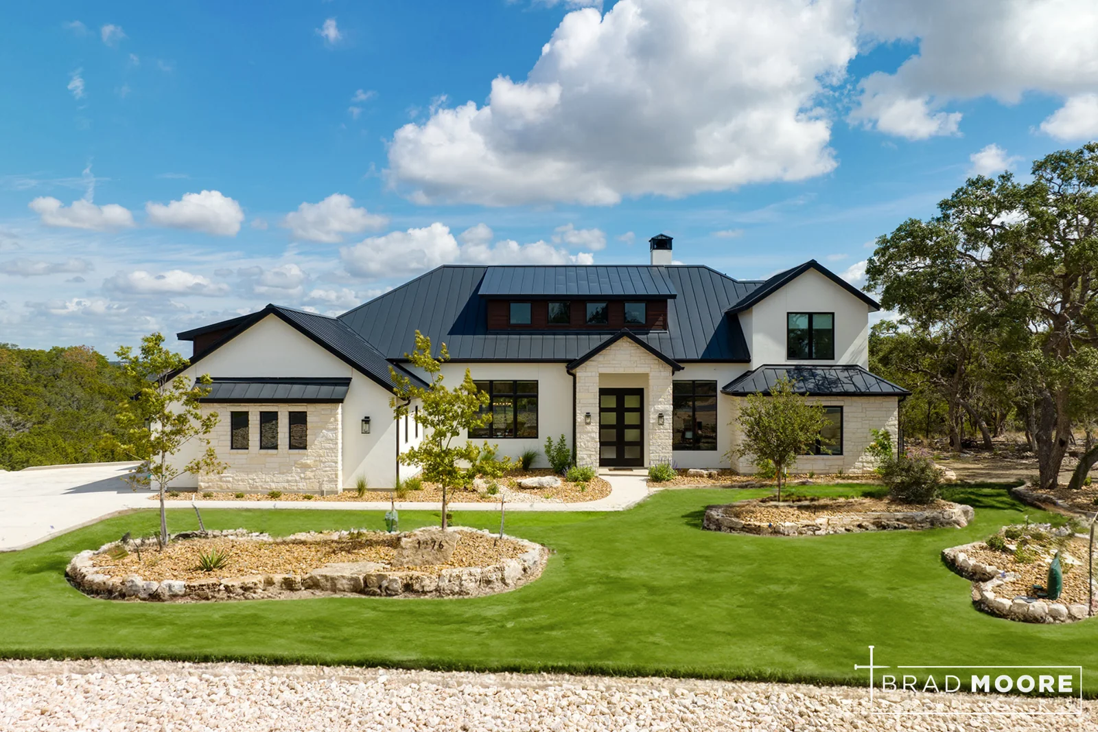 Front exterior of a Brad Moore Builders custom home at Paradise on the Guadalupe