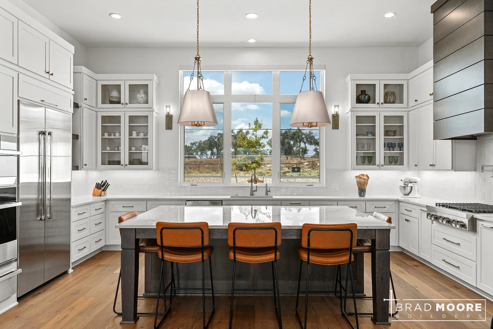 Luxury kitchen with custom cabinetry and large island at Paradise on the Guadalupe